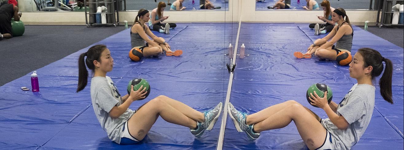 students exercising in gym