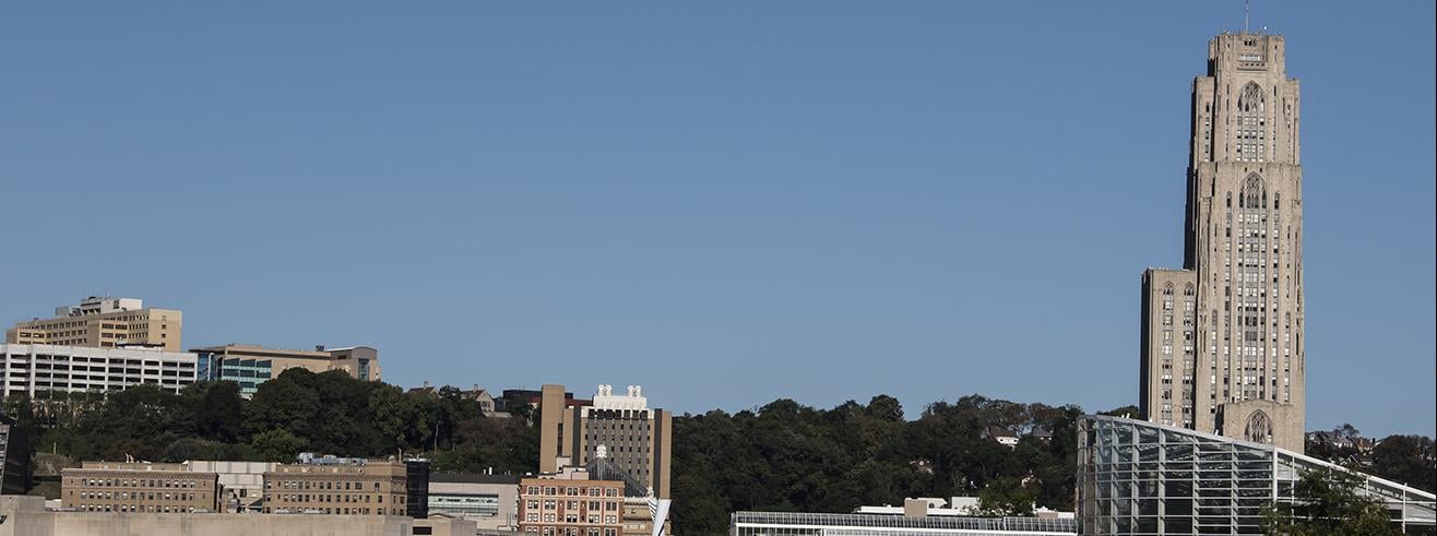 view of Cathedral of Learning against blue sky