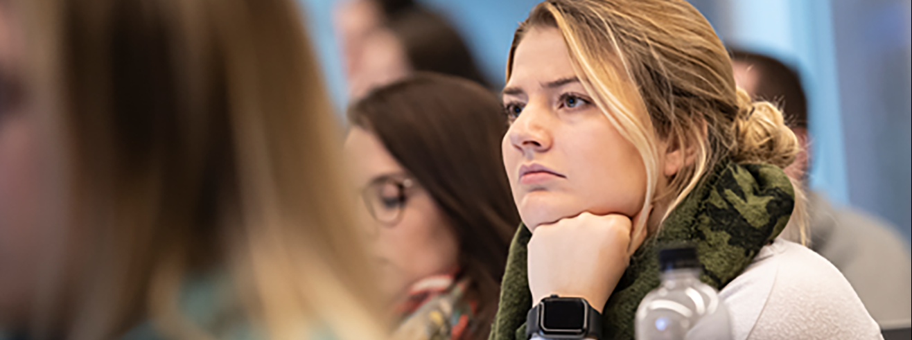 female student paying attention in class