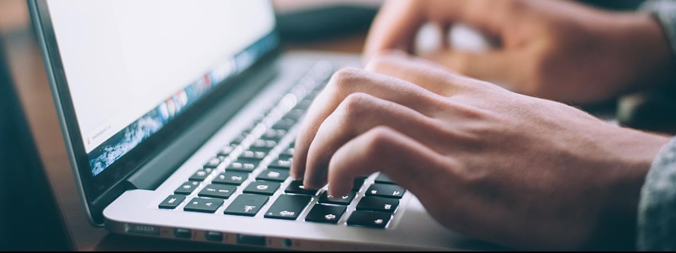 person typing on laptop Photo by glenn carstens peters on unsplash 