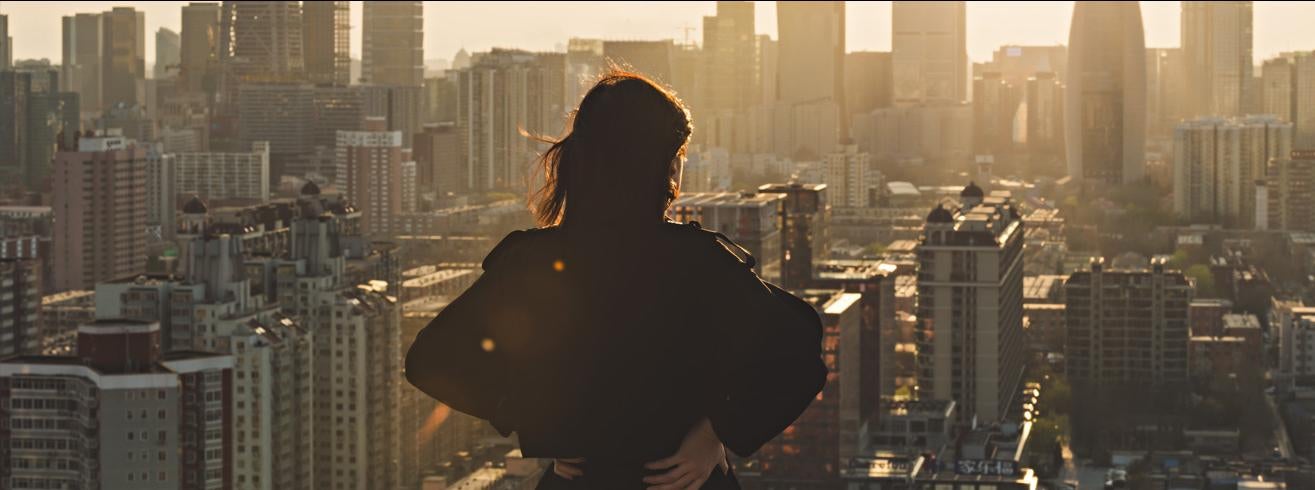 Person looking out into city view