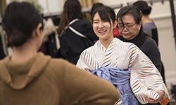 students dress in traditional Japanese kimonos for ceremony