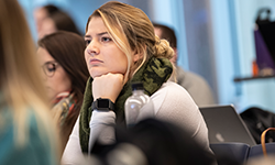 female student paying attention in class