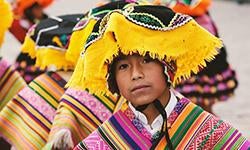 boy in traditional costume cusco peru