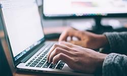 person typing on laptop Photo by glenn carstens peters on unsplash 