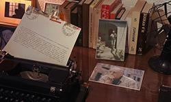 russian books, typewritten page on typewriter, photo of poet joseph brodsky