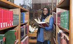 student in library